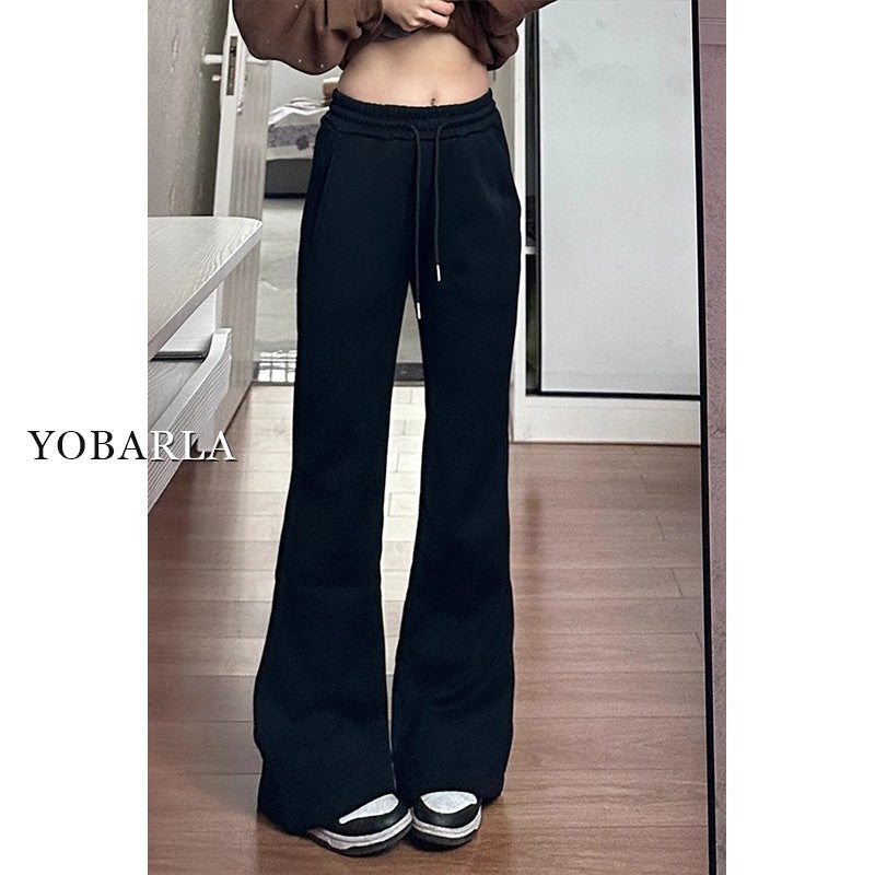 Women's black flared casual pants, autumn and winter style, fleece-lined, thickened, stretchy, plus size, flattering for pear-shaped figures, sporty sweatpants.