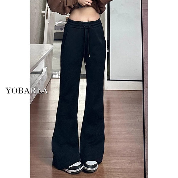 Women's black flared casual pants, autumn and winter style, fleece-lined, thickened, stretchy, plus size, flattering for pear-shaped figures, sporty sweatpants.