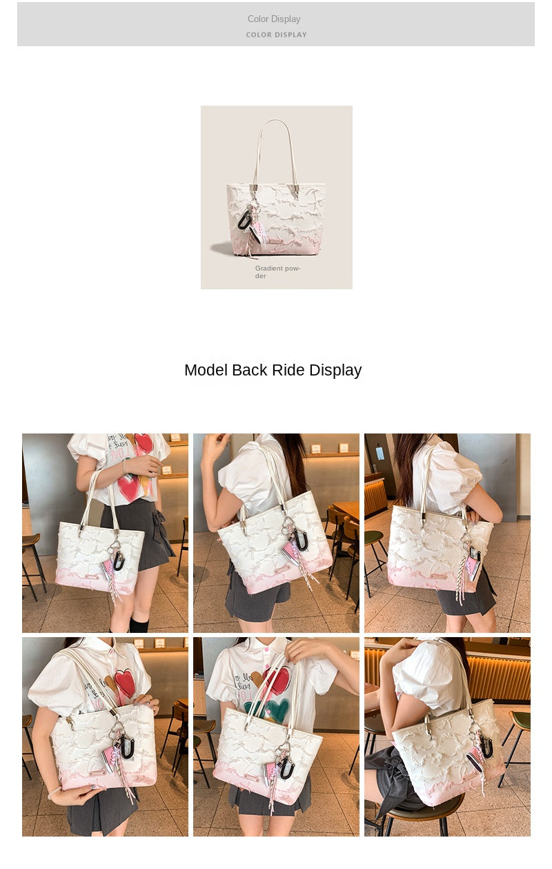 New niche tote bag for women, large capacity, suitable for commuting, handbag, shoulder bag, or underarm bag.