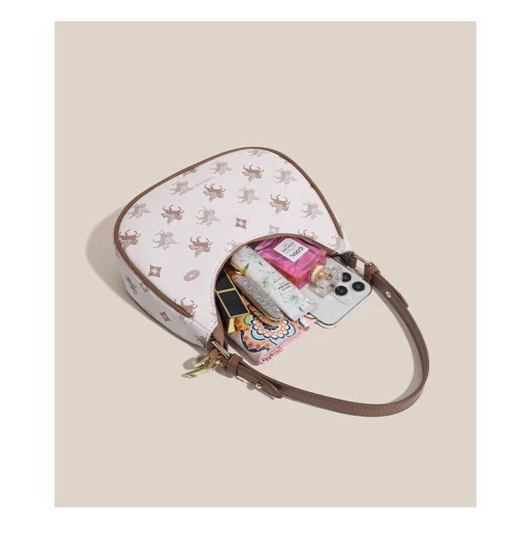 Original women's underarm bag, new spring/summer baguette bag for teenagers, niche crescent bag, high-end shoulder bag.