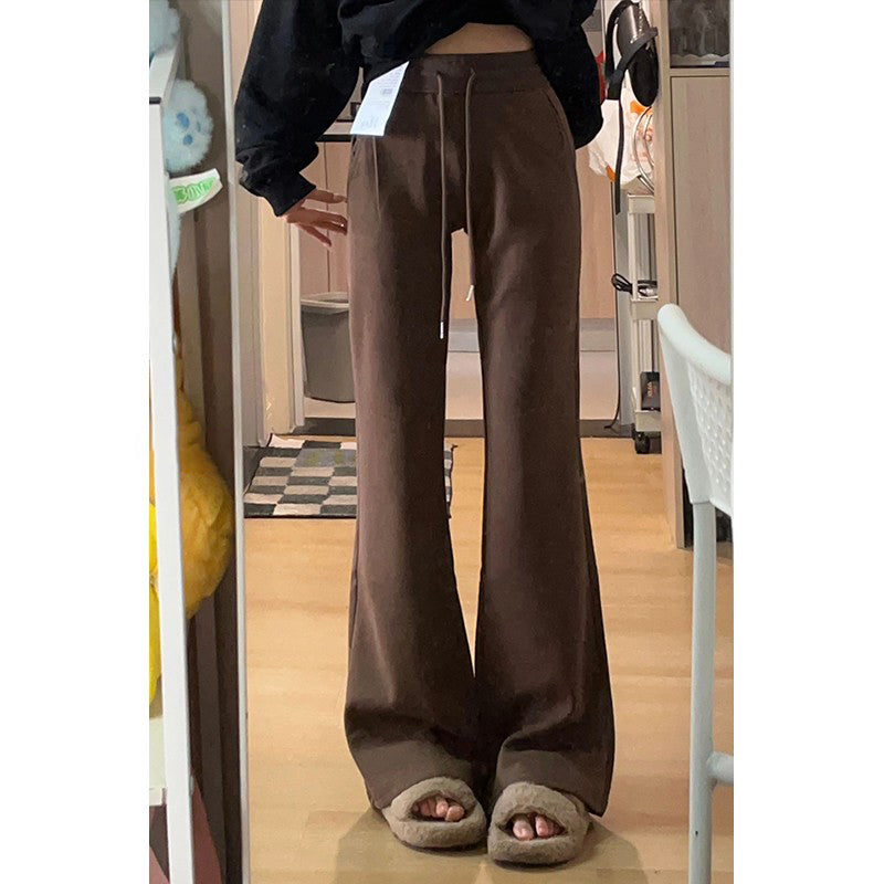 Women's black flared casual pants, autumn and winter style, fleece-lined, thickened, stretchy, plus size, flattering for pear-shaped figures, sporty sweatpants.