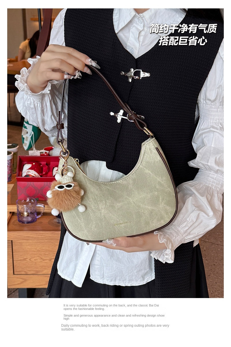 New women's baguette bag, sophisticated and trendy, suitable for underarms, shoulder bag, or handbag; crescent-shaped bag.