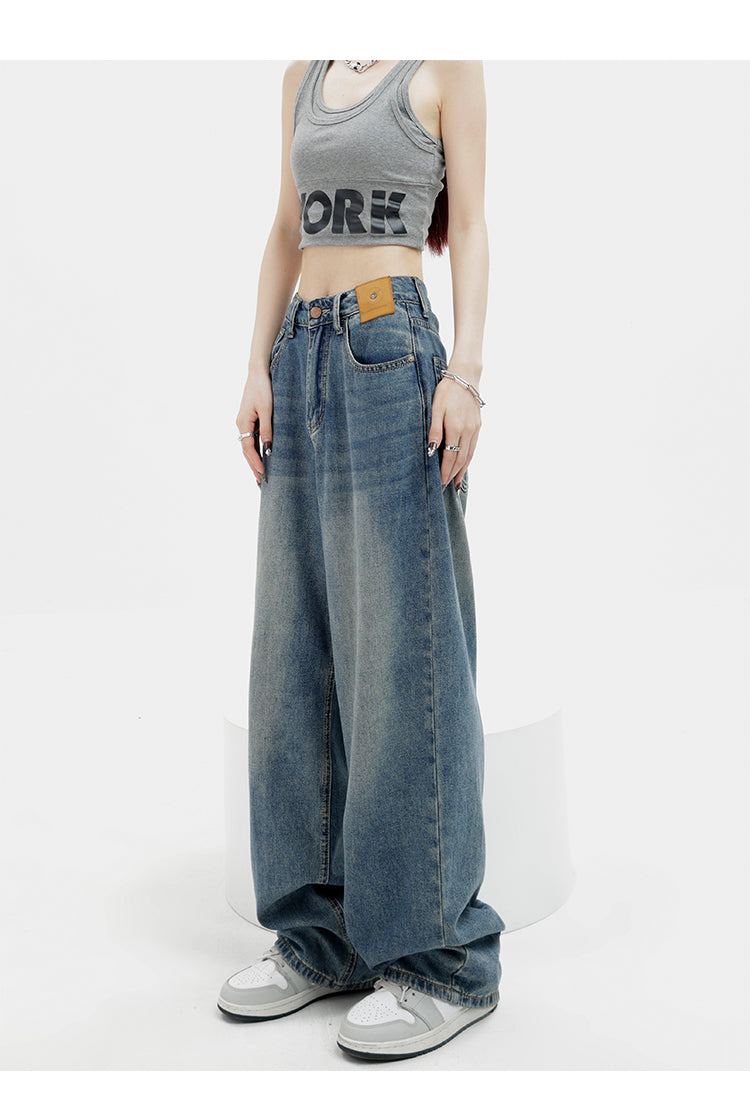 American retro blue straight-leg wide-leg jeans for women, casual and versatile, light-colored, floor-length trousers.