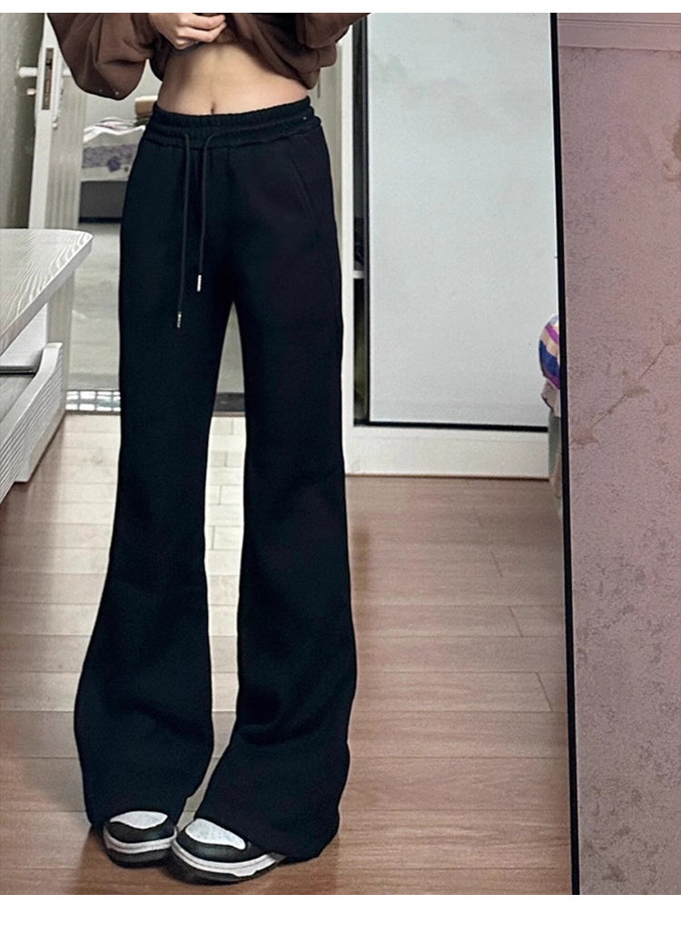 Women's black flared casual pants, autumn and winter style, fleece-lined, thickened, stretchy, plus size, flattering for pear-shaped figures, sporty sweatpants.
