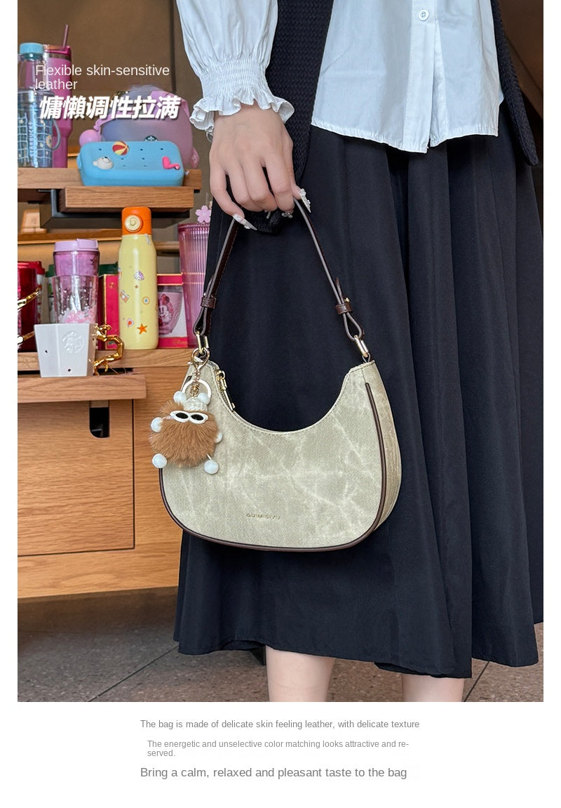 New women's baguette bag, sophisticated and trendy, suitable for underarms, shoulder bag, or handbag; crescent-shaped bag.