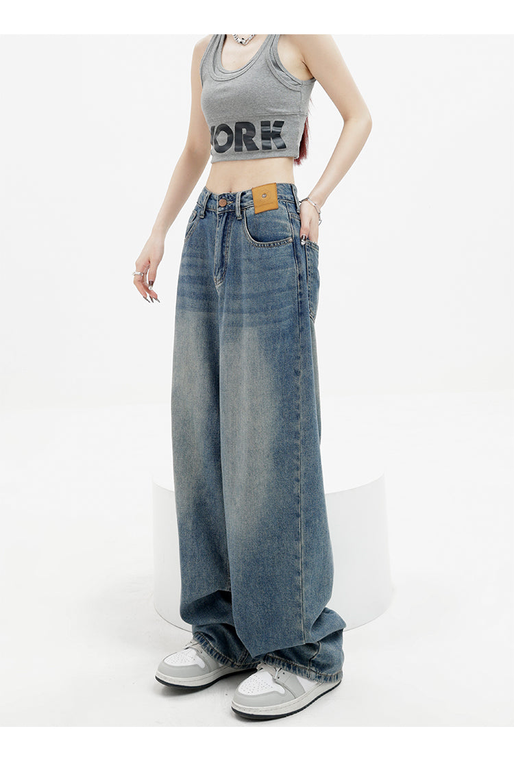 American retro blue straight-leg wide-leg jeans for women, casual and versatile, light-colored, floor-length trousers.