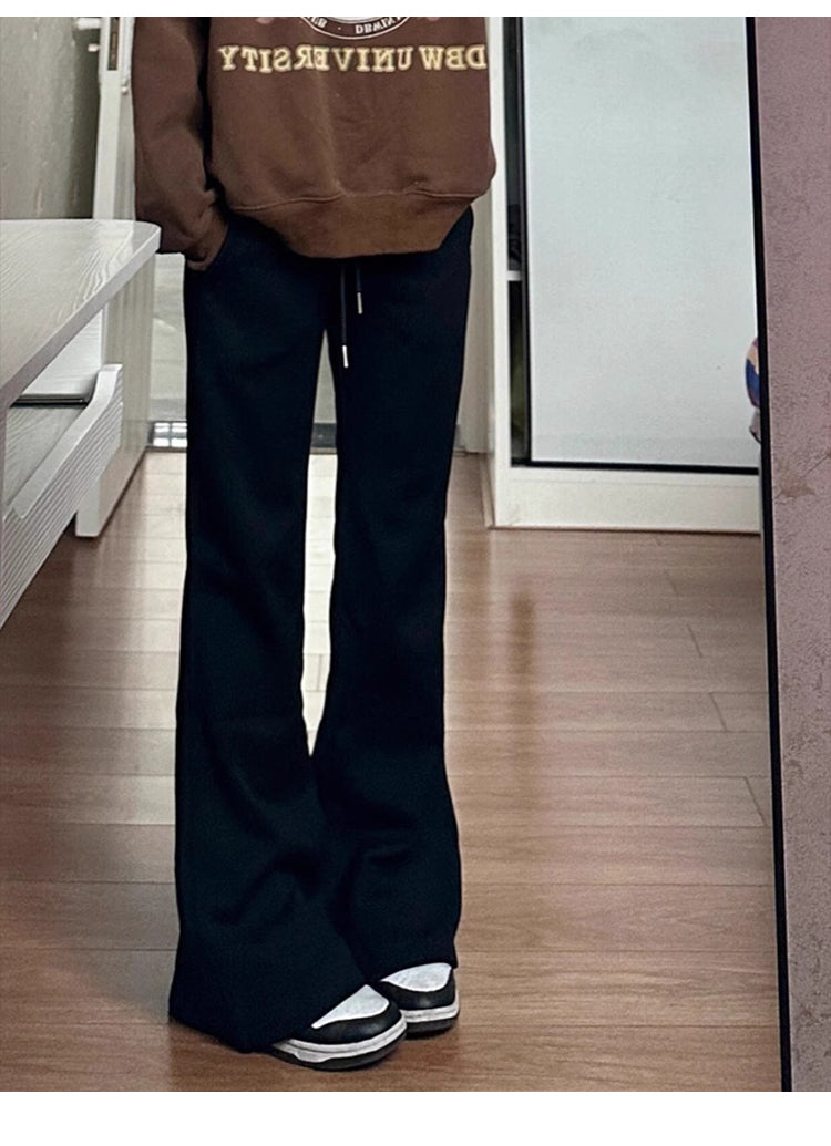 Women's black flared casual pants, autumn and winter style, fleece-lined, thickened, stretchy, plus size, flattering for pear-shaped figures, sporty sweatpants.