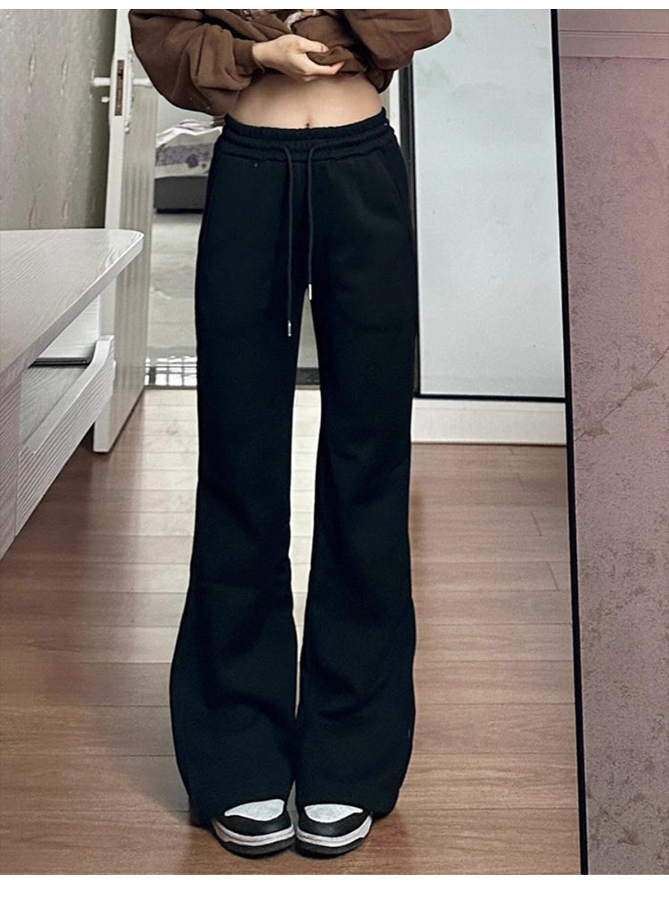 Women's black flared casual pants, autumn and winter style, fleece-lined, thickened, stretchy, plus size, flattering for pear-shaped figures, sporty sweatpants.