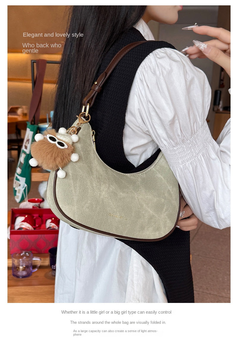 New women's baguette bag, sophisticated and trendy, suitable for underarms, shoulder bag, or handbag; crescent-shaped bag.