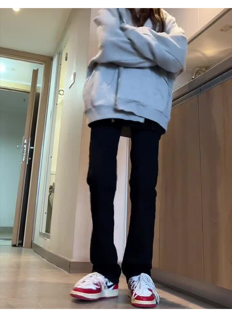 Women's black fleece-lined jeans for autumn and winter, plus size, high-waisted, stretchy, slim-fit straight leg, flattering for pear-shaped figures.