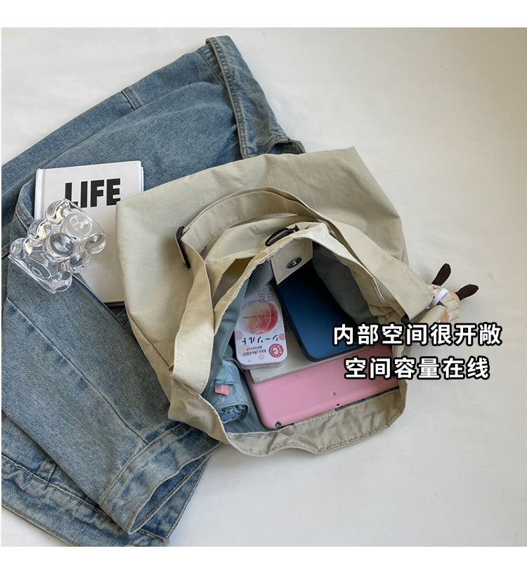New casual women's fashion cloth bag, shoulder bag, large capacity tote bag, suitable for commuting or going to class.