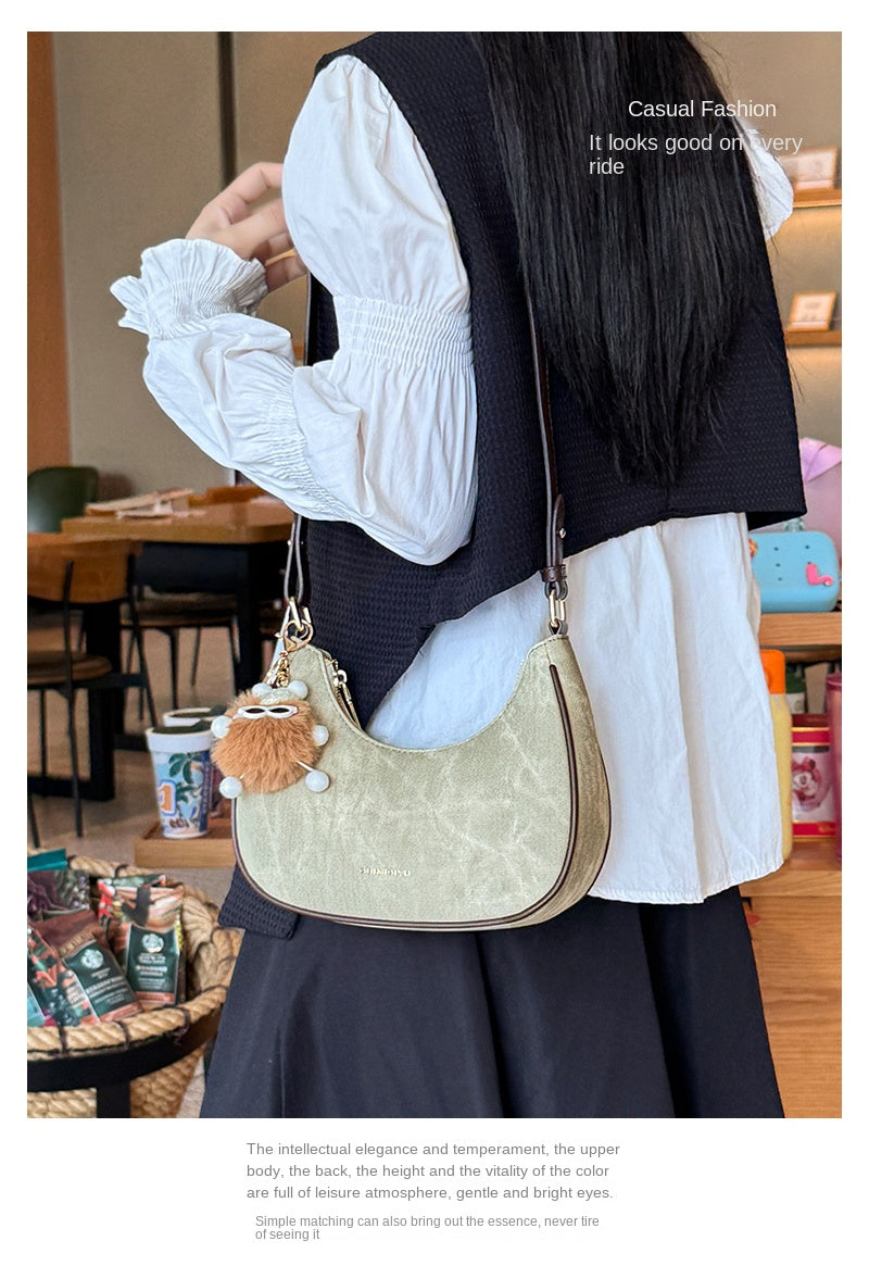 New women's baguette bag, sophisticated and trendy, suitable for underarms, shoulder bag, or handbag; crescent-shaped bag.