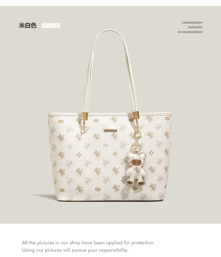 New niche handbag with large capacity for commuting to class, shoulder bag, or underarm bag.