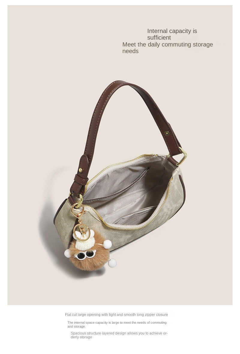 New women's baguette bag, sophisticated and trendy, suitable for underarms, shoulder bag, or handbag; crescent-shaped bag.