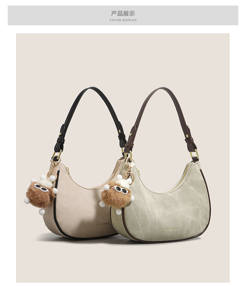 New women's baguette bag, sophisticated and trendy, suitable for underarms, shoulder bag, or handbag; crescent-shaped bag.