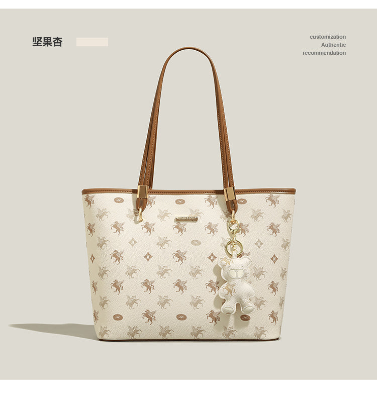 New niche handbag with large capacity for commuting to class, shoulder bag, or underarm bag.