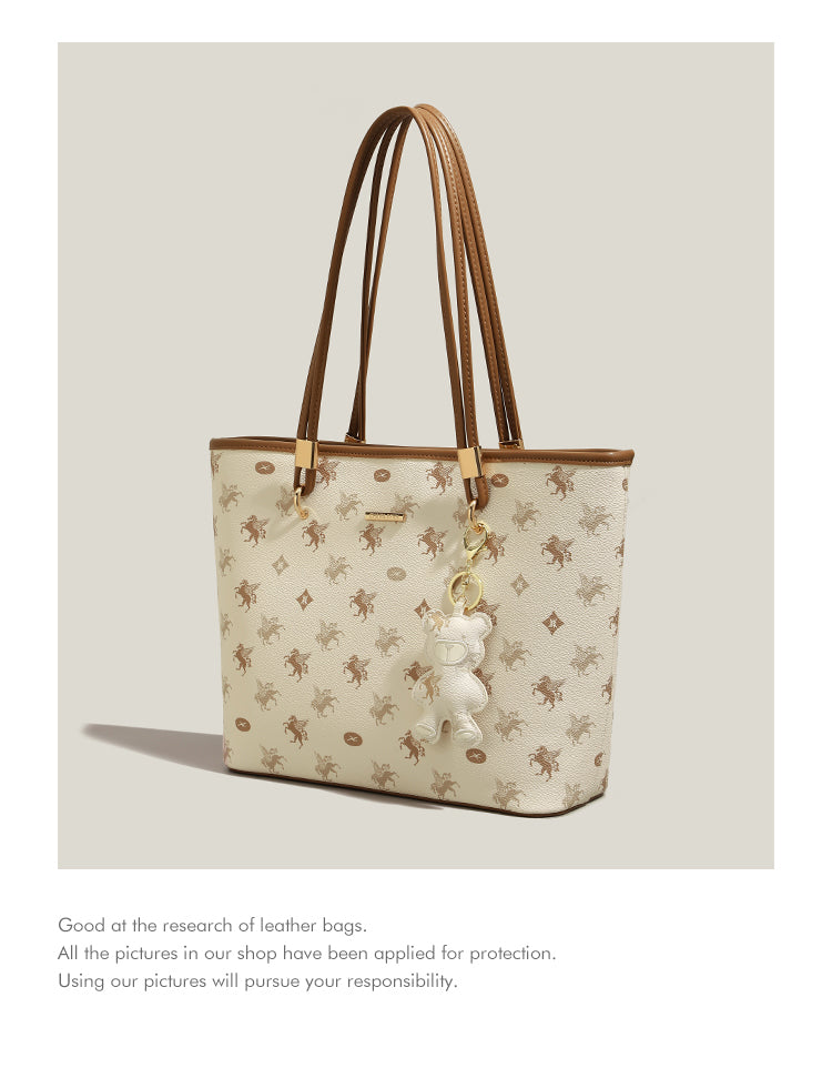 New niche handbag with large capacity for commuting to class, shoulder bag, or underarm bag.