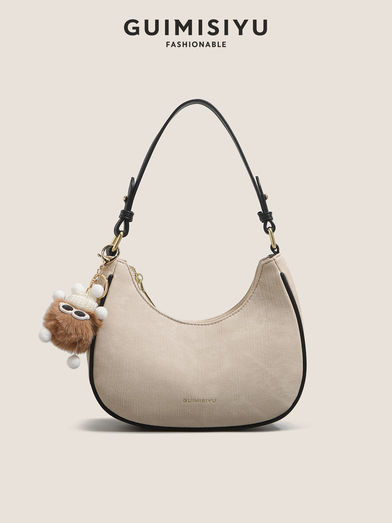 New women's baguette bag, sophisticated and trendy, suitable for underarms, shoulder bag, or handbag; crescent-shaped bag.