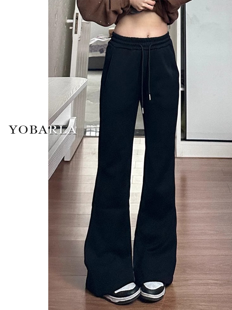 Women's black flared casual pants, autumn and winter style, fleece-lined, thickened, stretchy, plus size, flattering for pear-shaped figures, sporty sweatpants.
