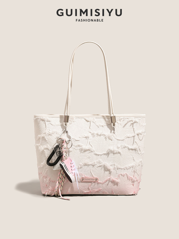 New niche tote bag for women, large capacity, suitable for commuting, handbag, shoulder bag, or underarm bag.