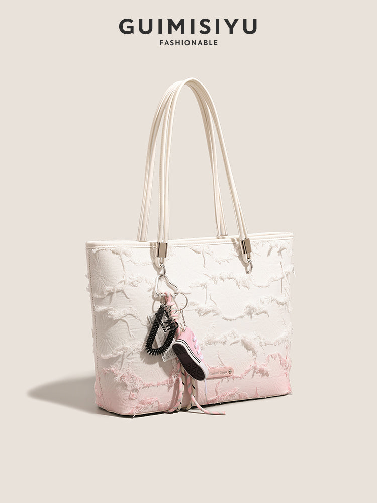 New niche tote bag for women, large capacity, suitable for commuting, handbag, shoulder bag, or underarm bag.