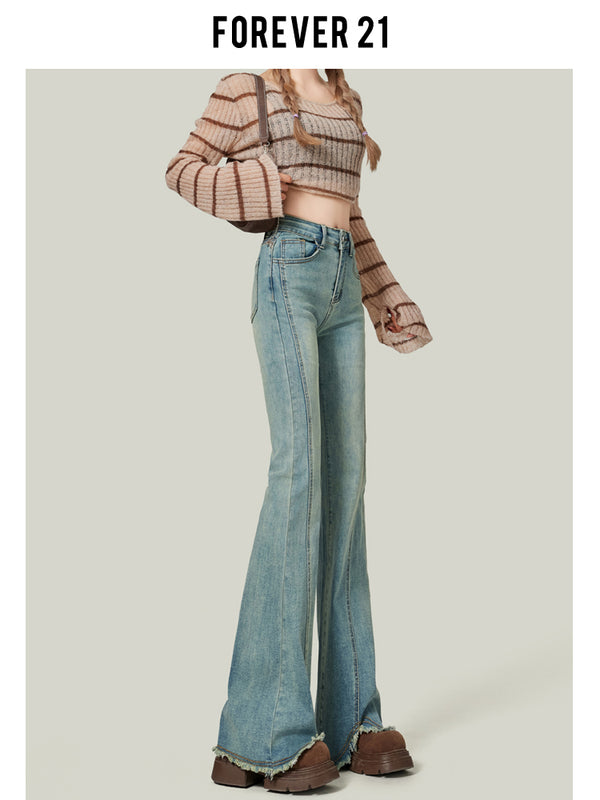 Light blue flared jeans for women, high-waisted, slim-fitting, platform style, floor-length.