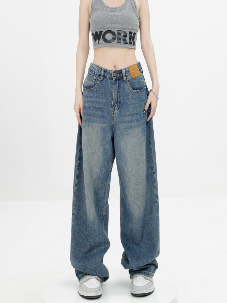 American retro blue straight-leg wide-leg jeans for women, casual and versatile, light-colored, floor-length trousers.