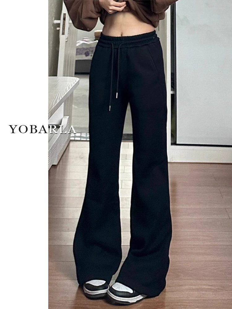 Women's black flared casual pants, autumn and winter style, fleece-lined, thickened, stretchy, plus size, flattering for pear-shaped figures, sporty sweatpants.