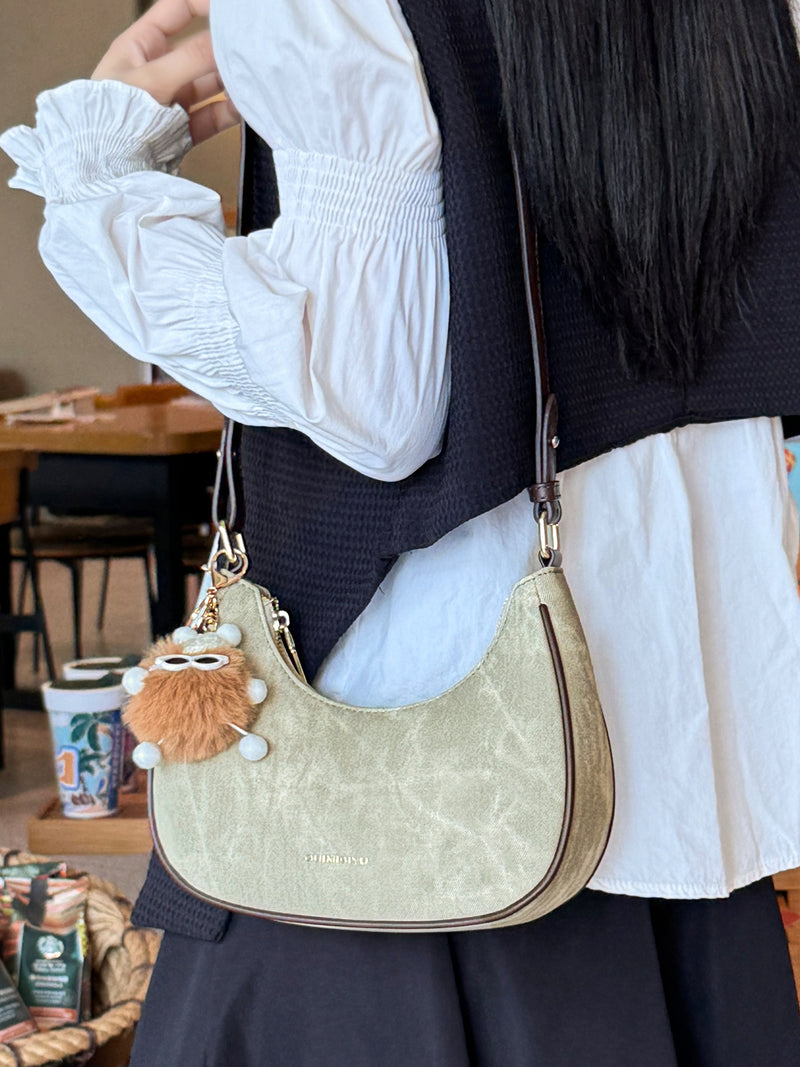 New women's baguette bag, sophisticated and trendy, suitable for underarms, shoulder bag, or handbag; crescent-shaped bag.