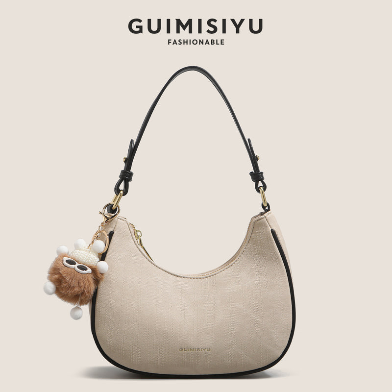 New women's baguette bag, sophisticated and trendy, suitable for underarms, shoulder bag, or handbag; crescent-shaped bag.