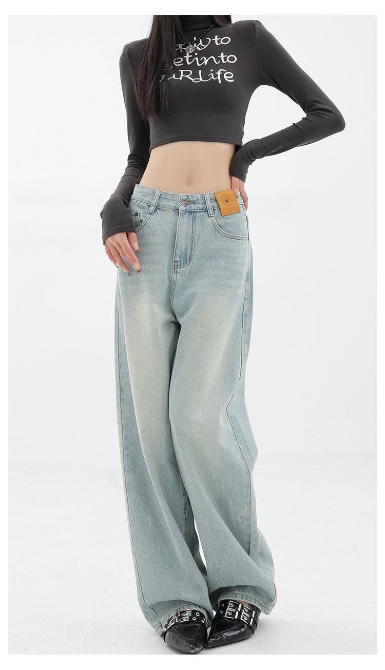 American retro blue straight-leg wide-leg jeans for women, casual and versatile, light-colored, floor-length trousers.