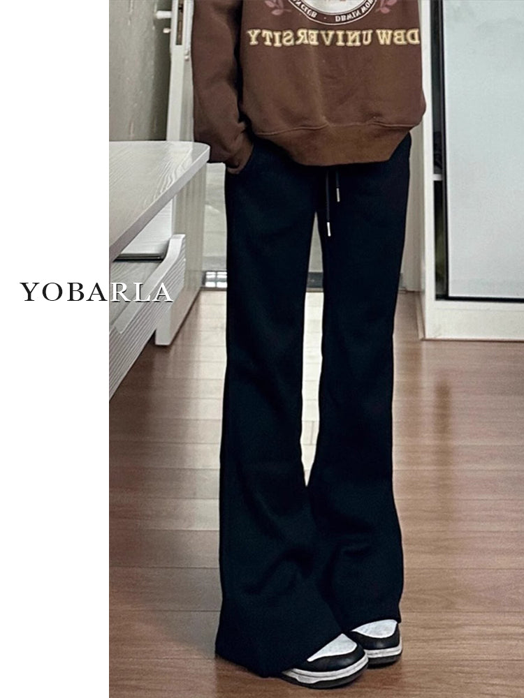 Women's black flared casual pants, autumn and winter style, fleece-lined, thickened, stretchy, plus size, flattering for pear-shaped figures, sporty sweatpants.