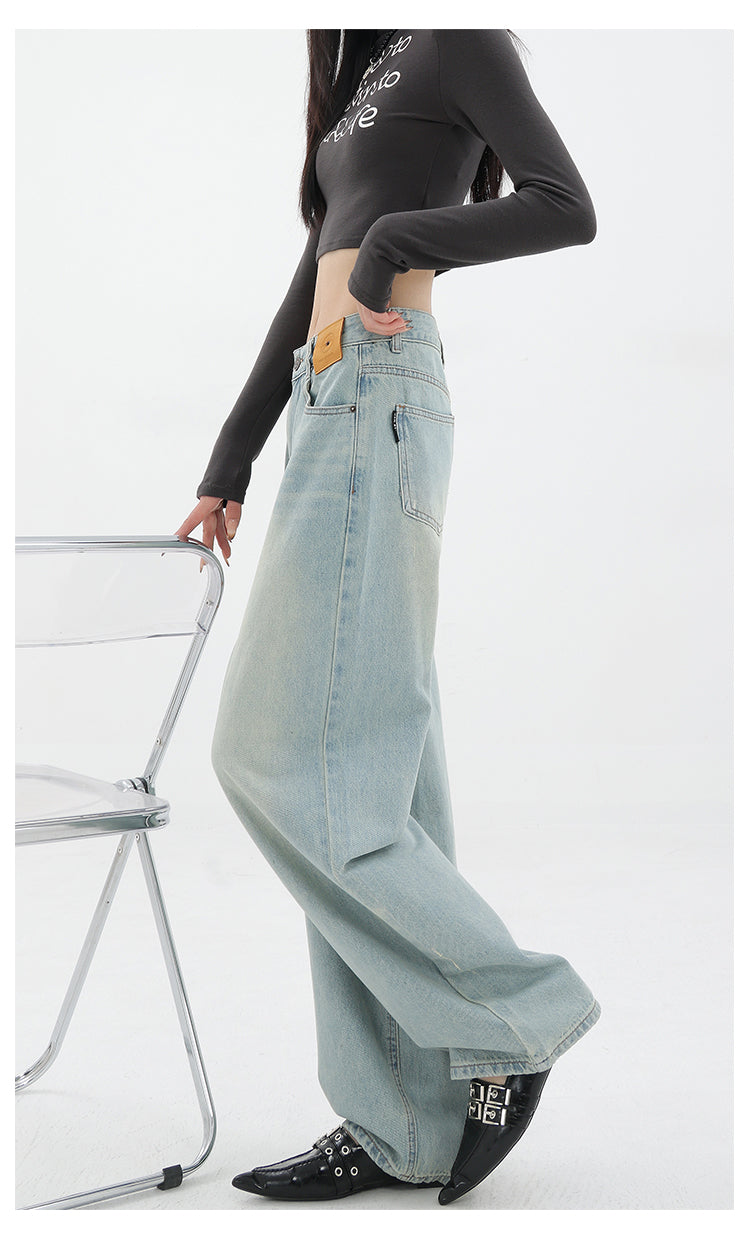 American retro blue straight-leg wide-leg jeans for women, casual and versatile, light-colored, floor-length trousers.