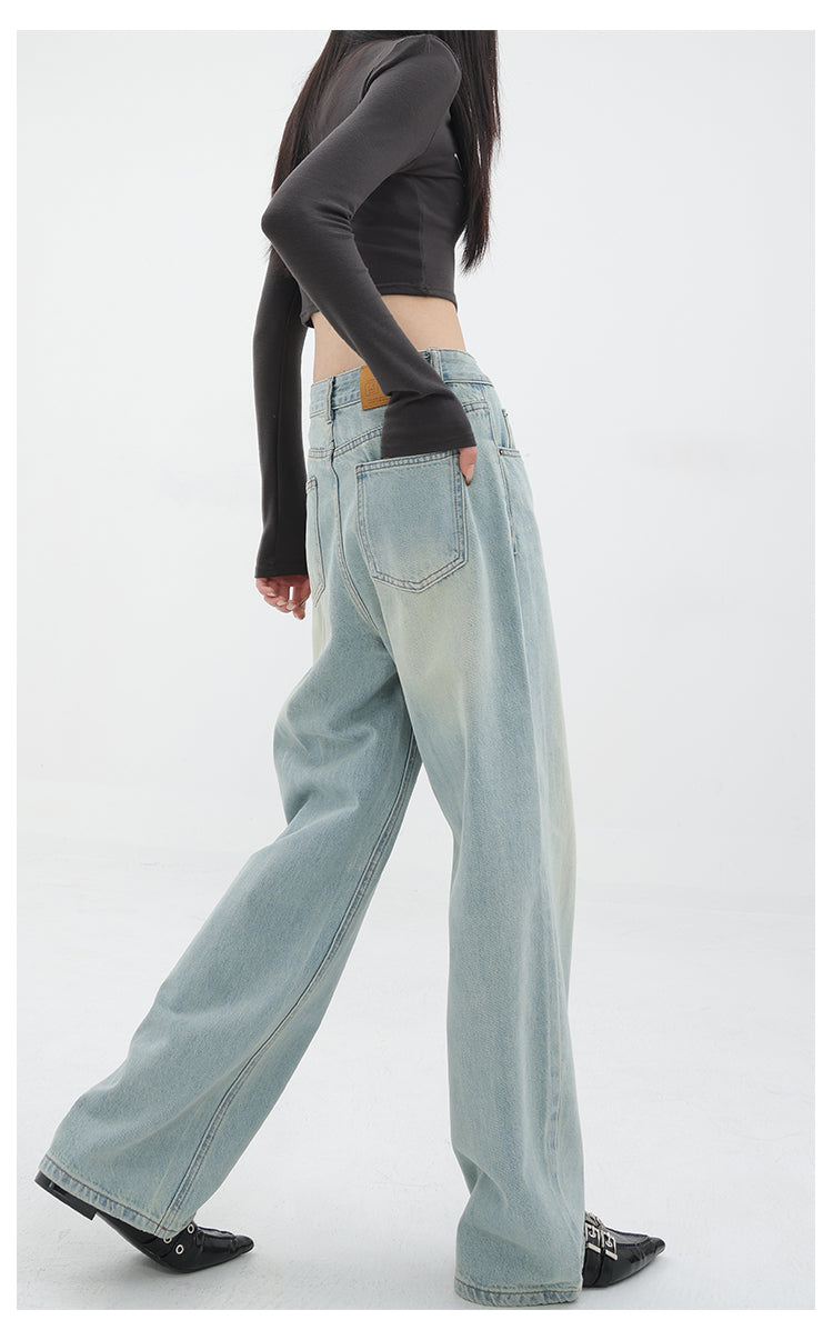 American retro blue straight-leg wide-leg jeans for women, casual and versatile, light-colored, floor-length trousers.