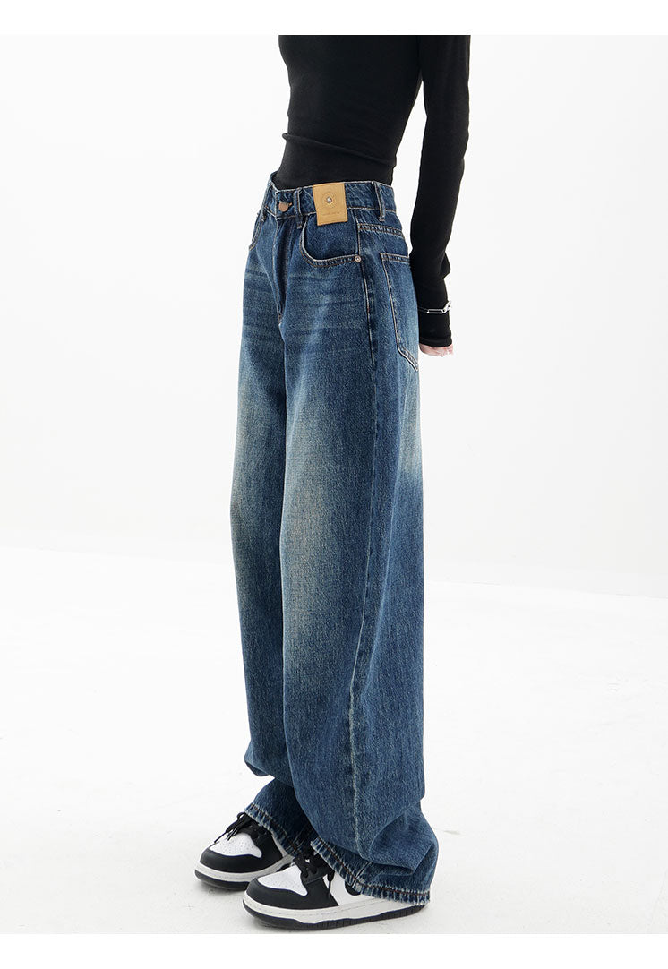 American retro blue straight-leg wide-leg jeans for women, casual and versatile, light-colored, floor-length trousers.