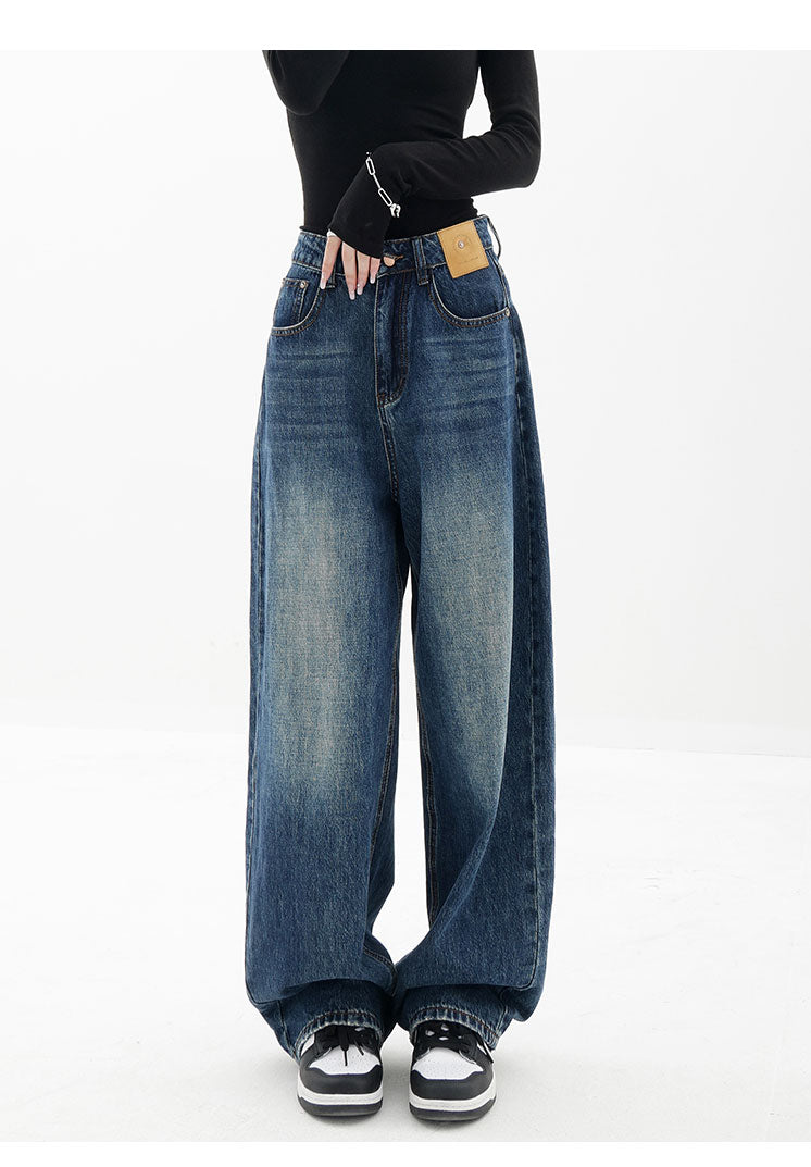 American retro blue straight-leg wide-leg jeans for women, casual and versatile, light-colored, floor-length trousers.