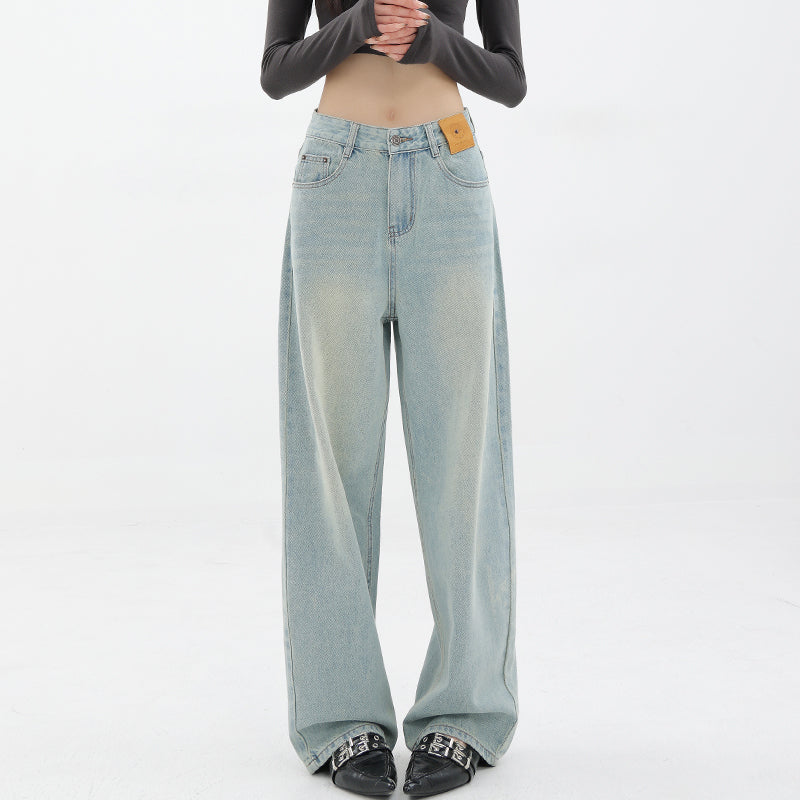 American retro blue straight-leg wide-leg jeans for women, casual and versatile, light-colored, floor-length trousers.